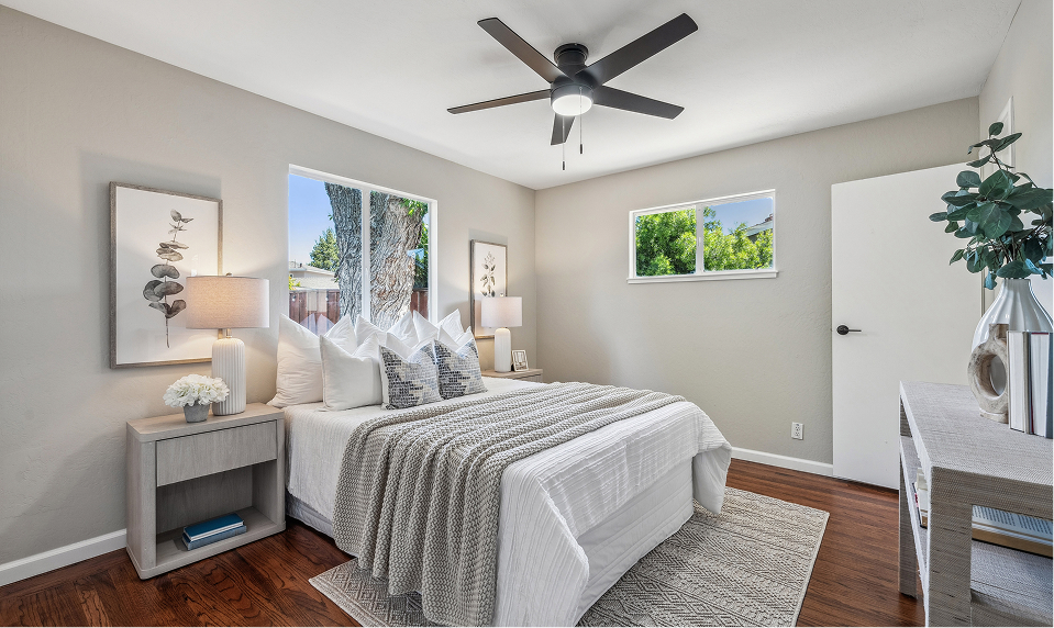Bedroom after refinishing floors and painting.